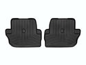 WeatherTech’s Floor Liner HP for Jeep Wrangler 2-Door (2018-, 2nd Row) are black, contoured mats with raised edges and grooves, protecting your interior carpet. Shown side by side on a white background.