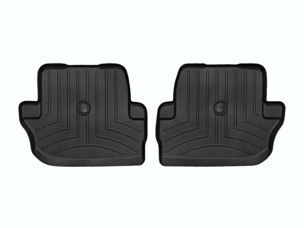 WeatherTech’s Floor Liner HP for Jeep Wrangler 2-Door (2018-, 2nd Row) are black, contoured mats with raised edges and grooves, protecting your interior carpet. Shown side by side on a white background.