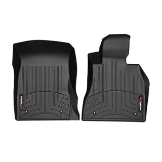 Two black, custom-molded WeatherTech FloorLiners for BMW 2 Series Active Tourer (F45) 2014–2020/X1 AWD (F48) front row feature grooved patterns, raised edges for superior protection, and a small branded tag in the corner.
