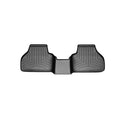 The Weathertech Floorliner for BMW X4 (2010-2018)(F26) and X3 (2010-2017)(F25), 2nd row, features black rubber with raised edges and grooves, delivering superior rear carpet protection. Isolated on a white background.