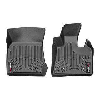 Two custom-fit black WeatherTech Floorliners for BMW X3 (2014-2017) and X4 (2010-2018), 1st row, feature raised edges and grooves to trap dirt and water, protecting your carpet. Displayed side by side on a white background.