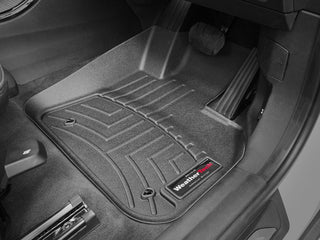Close-up of a black WeatherTech FloorLiner for BMW 2 Series Active Tourer (F45) 2014–2020 / X1 AWD (F48) 1st Row, protecting the driver’s side floor and keeping carpet near the pedals safe from dirt and wear.