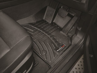 WeatherTech FloorLiner for BMW 5 Series (G30/G31) 2017, installed on the driver’s side, provides floor protection and acts as a carpet liner near the pedals and seat.
