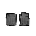 The Weathertech Floorliner for Toyota Land Cruiser Prado J150 (2010-, 1st Row) features black rubber mats with textured grooves, raised edges, and secure attachment buttons to protect your front interior carpet.