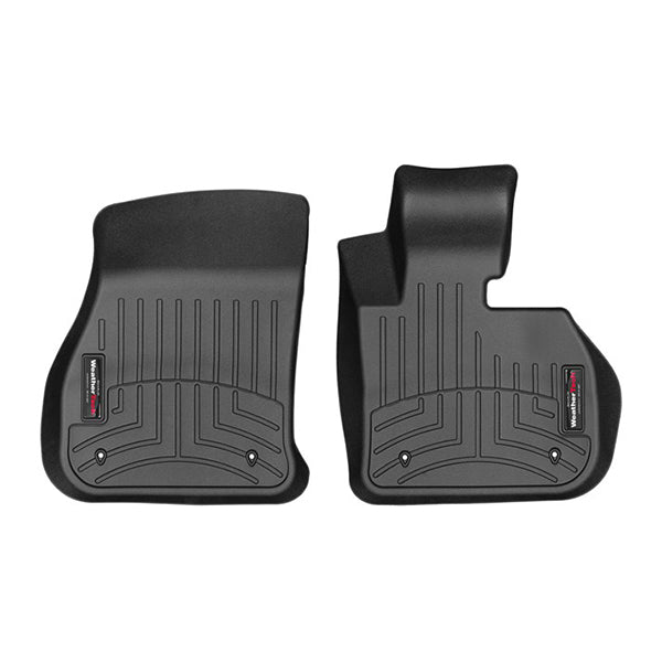 The Weathertech Floorliner for Mini Countryman F60 (2017-2024) includes two black 1st row mats with grooved patterns and raised edges for maximum carpet protection, designed for front seats and featuring a subtle brand label.