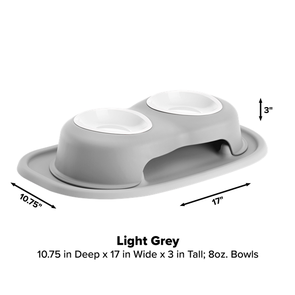 The WeatherTech Double Elevated Pet Feeding System by WeatherTech features two white, 8oz spill-proof bowls in a raised light grey holder (10.75"D x 17"W x 3"H) with a curved base and rim; arrows indicate dimensions.