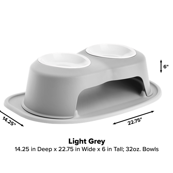 The WeatherTech Double Elevated Pet Feeding System features a light grey arched design with two 32 oz white spill-proof bowls. Sized 14.25"D x 22.75"W x 6"H, its raised base adds ergonomic comfort for your pet.