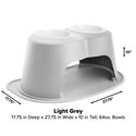 The WeatherTech Double Elevated Pet Feeding System by Weathertech features two 64-oz spill-proof bowls, arched openings for easy cleaning, and a stylish light grey design. Measures 17.75"D x 27.75"W x 10"H.