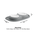 The WeatherTech Double Compact Pet Feeding System by WeatherTech in dark grey features two 16 oz ergonomic bowls on a raised mat (11.25"D x 18"W x 2"H). This space-saving feeder sits flat against a plain background.