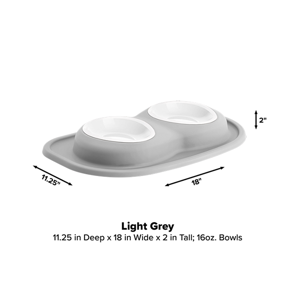The WeatherTech Double Compact Pet Feeding System features light grey, raised 16oz ergonomic bowls on an attached mat. Measuring 11.25" deep, 18" wide, and 2" tall, this space-saving WeatherTech feeder is shown on a plain white background.