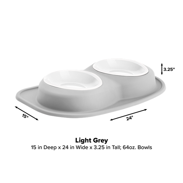 The WeatherTech Double Compact Pet Feeding System in light grey includes a mat and two ergonomic 64 oz bowls. Measuring 15" deep x 24" wide x 3.25" tall, this space-saving feeder is a smart solution for your home from WeatherTech.