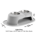 The WeatherTech Double Elevated Pet Feeding System features two 32 oz stainless steel bowls, measurement labels, and an ergonomic light grey design. Dimensions: 14.25" deep x 22.75" wide x 6" tall. Brand: WeatherTech.