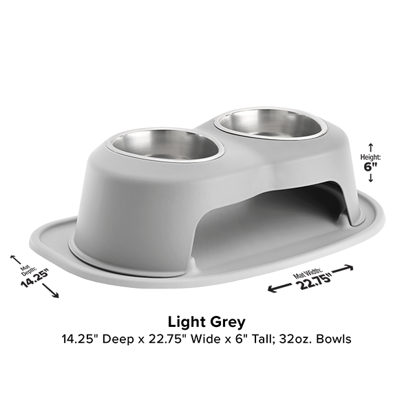 The WeatherTech Double Elevated Pet Feeding System features two 32 oz stainless steel bowls, measurement labels, and an ergonomic light grey design. Dimensions: 14.25" deep x 22.75" wide x 6" tall. Brand: WeatherTech.
