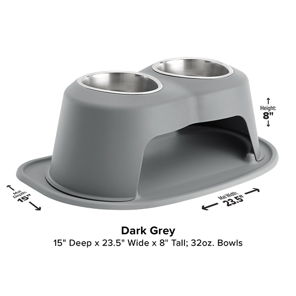 The WeatherTech Double Elevated Pet Feeding System by Weathertech is dark grey with two 32-oz stainless steel bowls. It measures 15" deep, 23.5" wide, and 8" tall; arrows highlight the width (23.5") and height (8").
