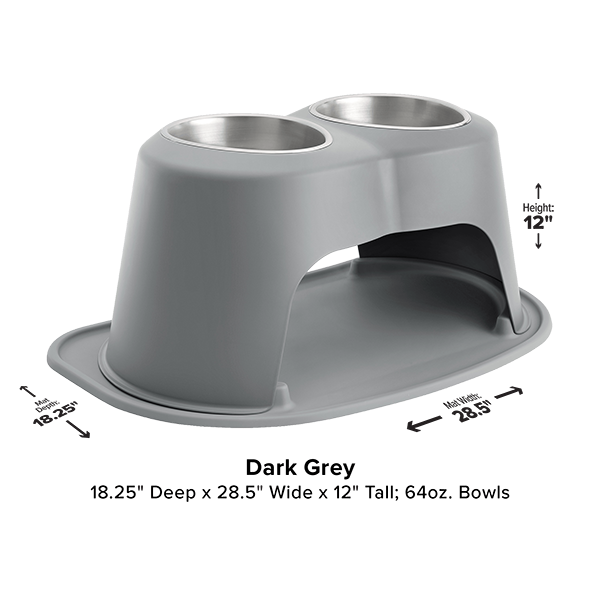 The WeatherTech Double Elevated Pet Feeding System by WeatherTech features a raised dark grey platform with two stainless steel, spill-proof bowls. Measures 18.25"D x 28.5"W x 12"H and includes open space underneath for easy cleanup.