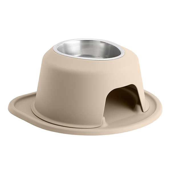 The WeatherTech Single Elevated Pet Feeding System by Weathertech features a beige finish, stainless steel insert, and attached oval tray. Its spill-proof design includes an arched opening underneath for a sheltered, comfortable feeding area.
