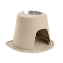 The WeatherTech Single Elevated Pet Feeding System by Weathertech features a beige, spill-proof base with an arched opening below, a stainless steel bowl on top, and a small sheltered space underneath for added convenience.