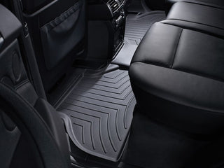 Weathertech Floorliner for BMW X5/X6 (E70/E71) 2007-2014, 2nd Row, offers durable black rubber all-weather protection for your rear floor, complementing black leather seats—an ideal alternative to traditional carpet mats.