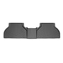 The WeatherTech Floorliner for BMW X5/X6 (E70/E71) 2007-2014, 2nd Row, is a black rubber car mat with raised edges and grooves, designed to fit the rear floor and protect your carpet from dirt and spills.