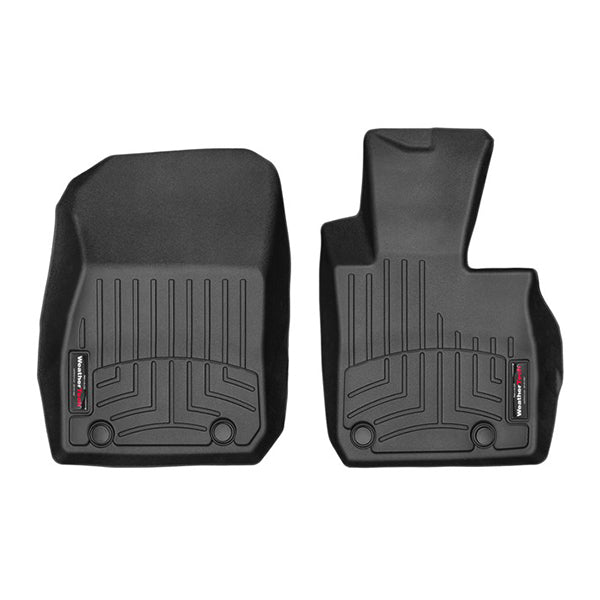 The WeatherTech FloorLiner for Mazda CX-3 (2015-2021) features two contoured black mats with grooves, branded labels, and all-weather protection for driver and passenger front sides to safeguard your interior carpet.