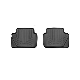 Weathertech Floorliner for Ford Fiesta 6th Gen (2008-2017), 2nd Row: Two black, rectangular mats with raised edges and grooves, shown side by side on a white background, provide top carpet protection.