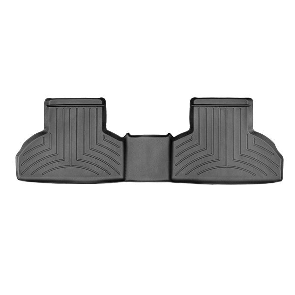 The Weathertech Floorliner for BMW X5 (2013-2018) (F15) 2nd Row is a black, contoured mat with raised edges and grooves, offering superior backseat floor protection from dirt and moisture.