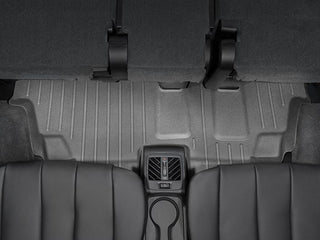Rear seat view showcasing WeatherTech FloorLiner for BMW X5 (2013-2018, F15) 3rd Row, offering superior floor protection along with visible cup holders, air vents, and backrests—all seen from the rear seats.