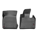 Two custom-fit black WeatherTech Floorliners for BMW X3 (2014-2017) and X4 (2010-2018), 1st row, feature raised edges and grooves to trap dirt and water, protecting your carpet. Displayed side by side on a white background.