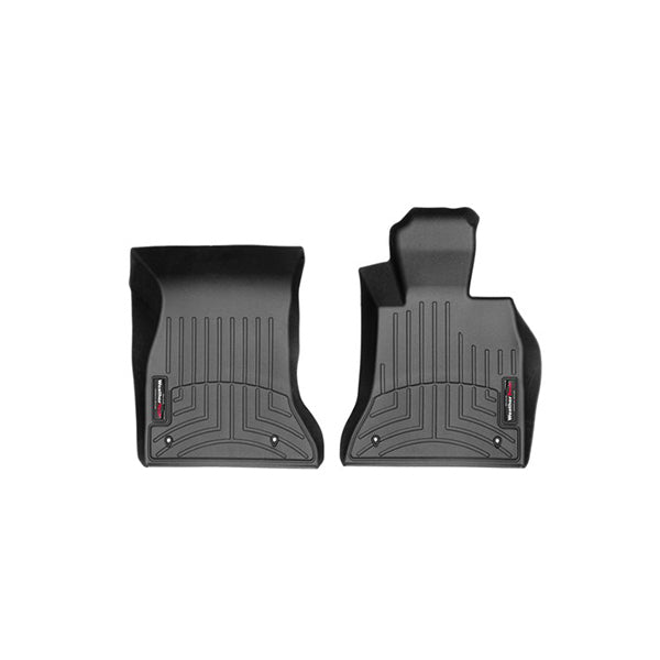 WeatherTech FloorLiner for BMW 5 Series Sedan/Wagon (2014-2017, F10/F11), 1st Row, features two black custom-molded mats with grooved patterns and red and white logo tags, offering premium protection for your car’s interior.