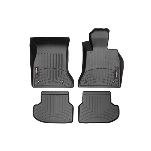 The WeatherTech FloorLiner for BMW 5 Series Sedan/Wagon (2014-2017) F10/F11, 1st row, offers custom-fit black rubber floor protection with raised edges and grooves, designed for superior front seat coverage and shown on a white background.