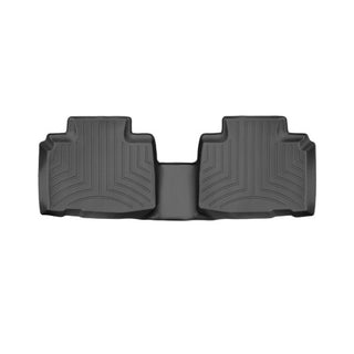 The WeatherTech Floorliner for Ford Edge (2016–) 2nd Row is a black molded rubber mat with raised edges and grooves, designed for superior rear floor protection, offering the same high quality as other WeatherTech car mats.