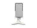A smartphone stands upright in the Weathertech DeskFone White, a desktop phone holder with a wide, stable base and adjustable stand, set against a plain white background.