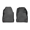 The Weathertech Floorliner for Ford Fiesta 7th Gen Manual (2017-2020) covers the 1st row with molded black rubber, grooved patterns, raised edges, and a branded label—offering superior protection and fit as an interior carpet liner.