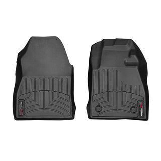 The Weathertech Floorliner for Ford Fiesta 7th Gen Manual (2017-2020) covers the 1st row with molded black rubber, grooved patterns, raised edges, and a branded label—offering superior protection and fit as an interior carpet liner.