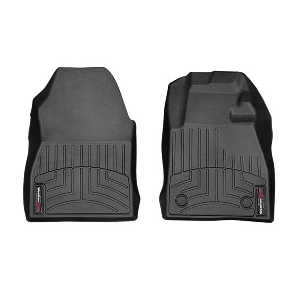The Weathertech Floorliner for Ford Fiesta 7th Gen Manual (2017-2020) covers the 1st row with molded black rubber, grooved patterns, raised edges, and a branded label—offering superior protection and fit as an interior carpet liner.