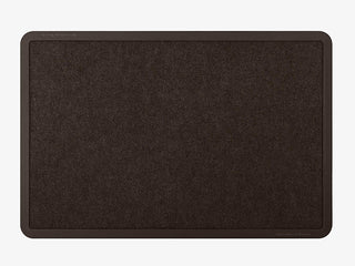 The WeatherTech Carpet Mat by Weathertech is a rectangular dark brown entrance mat with a textured fabric surface and slightly raised border, displayed on a light gray background.