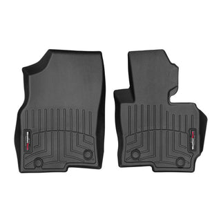 Weathertech Floorliner for Mazda CX-5 (2012-2017) - 1st Row: Two black, custom-fit rubber mats with textured grooves, raised edges, and a small rectangular logo provide superior carpet protection for driver and passenger sides.