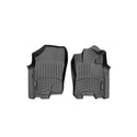The Weathertech Floorliner for Nissan Navara (2016-2020) - 1st Row, shown in black on a white background, features custom fit, raised edges, and textured surfaces to protect your front interior carpet and keep it clean.