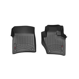 Weathertech Floorliner for Porsche Cayenne 3rd Gen (2013-2017) 1st Row—black molded rubber mats with textured, raised patterns and snap fasteners offer reliable front carpet protection for vehicles with 4 Zone Climate, shown on a white background.