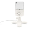 A Weathertech DeskFone White securely holds a smartphone vertically on a desk with its adjustable knob for stability. A charging cable is connected at the bottom.
