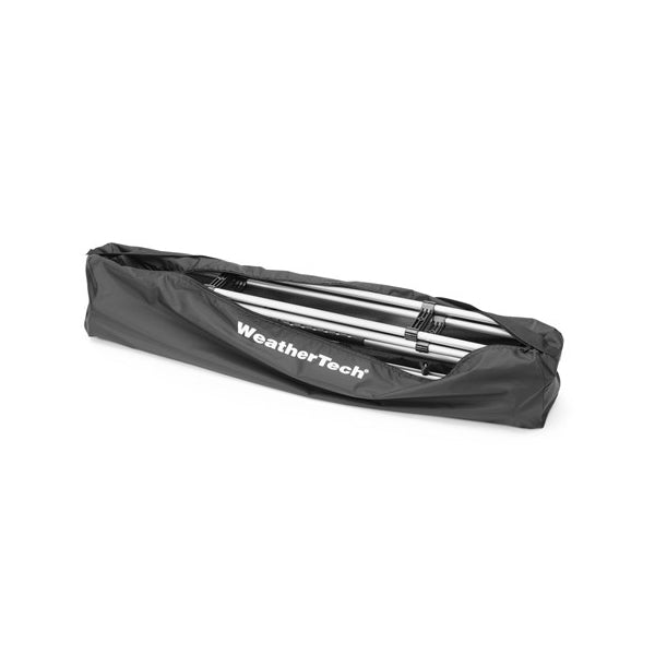 The WeatherTech Pet Barrier Storage Bag is a black, USA-made 200D nylon bag that holds a folded metal frame—perfect for storing portable items like cargo carriers or sunshades.